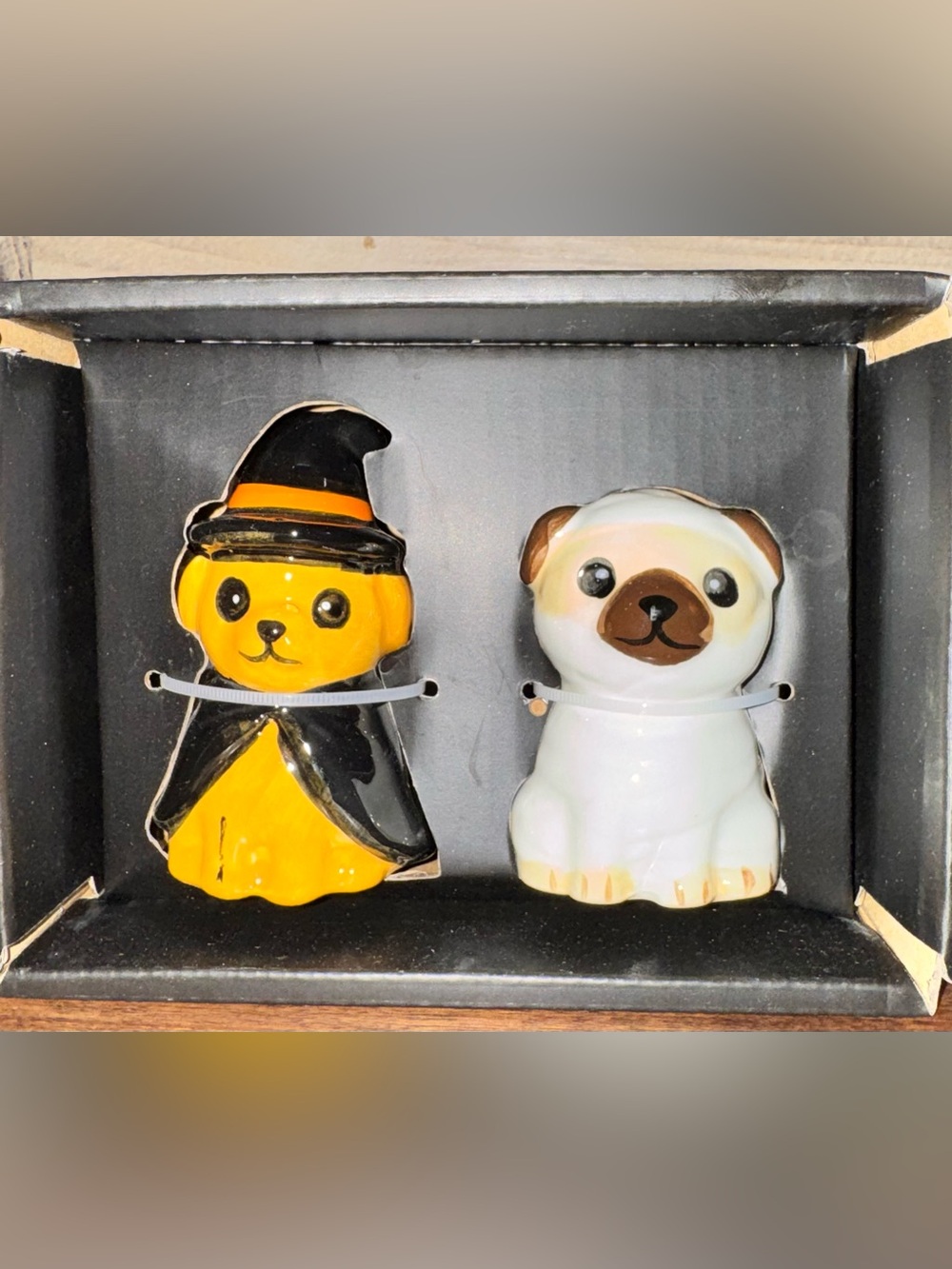 Cute 🥰 salt & pepper shakers  dogs 🐕 wearing a witch 🧙 hat and a ghost 👻 costume